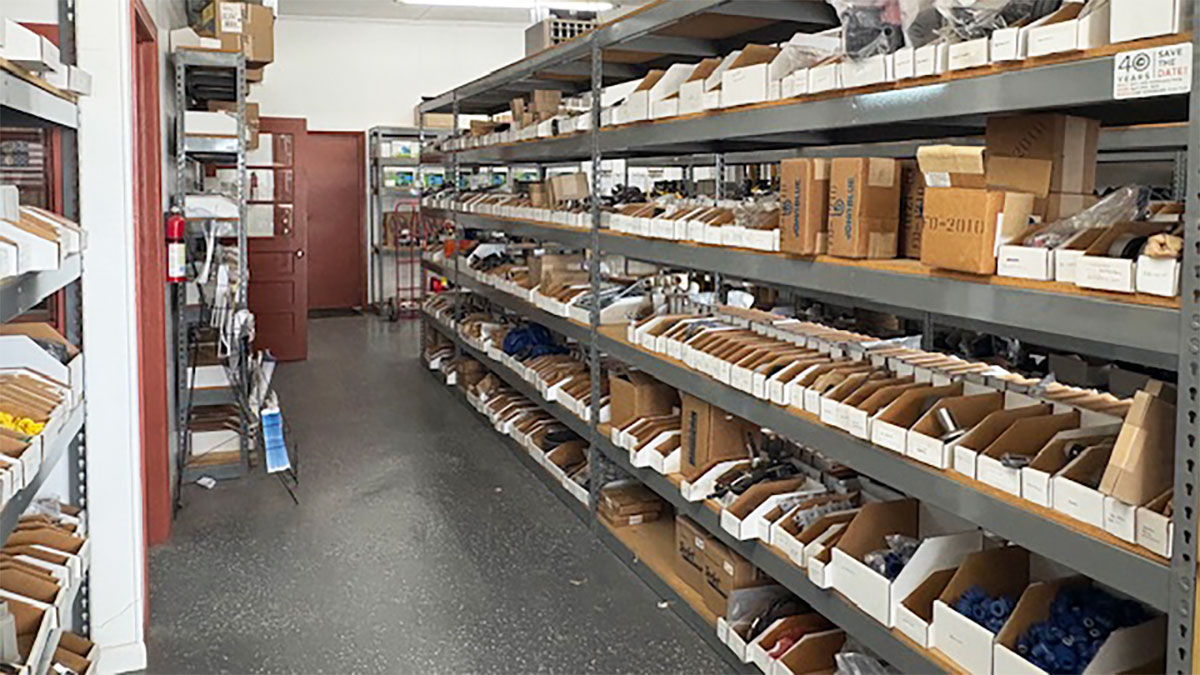 Chemical Containers Lyons store - inside plumbing fittings and spray valves display